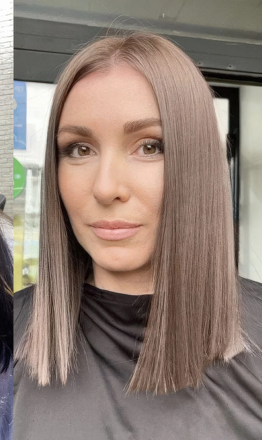 Long and straight mushroom brown bob with center part.