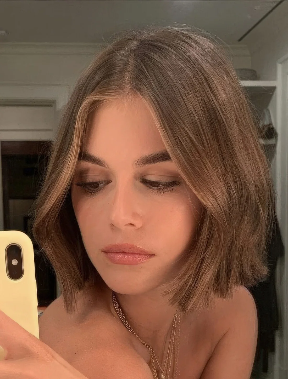 Light brown chin-length bob with a slight wave.