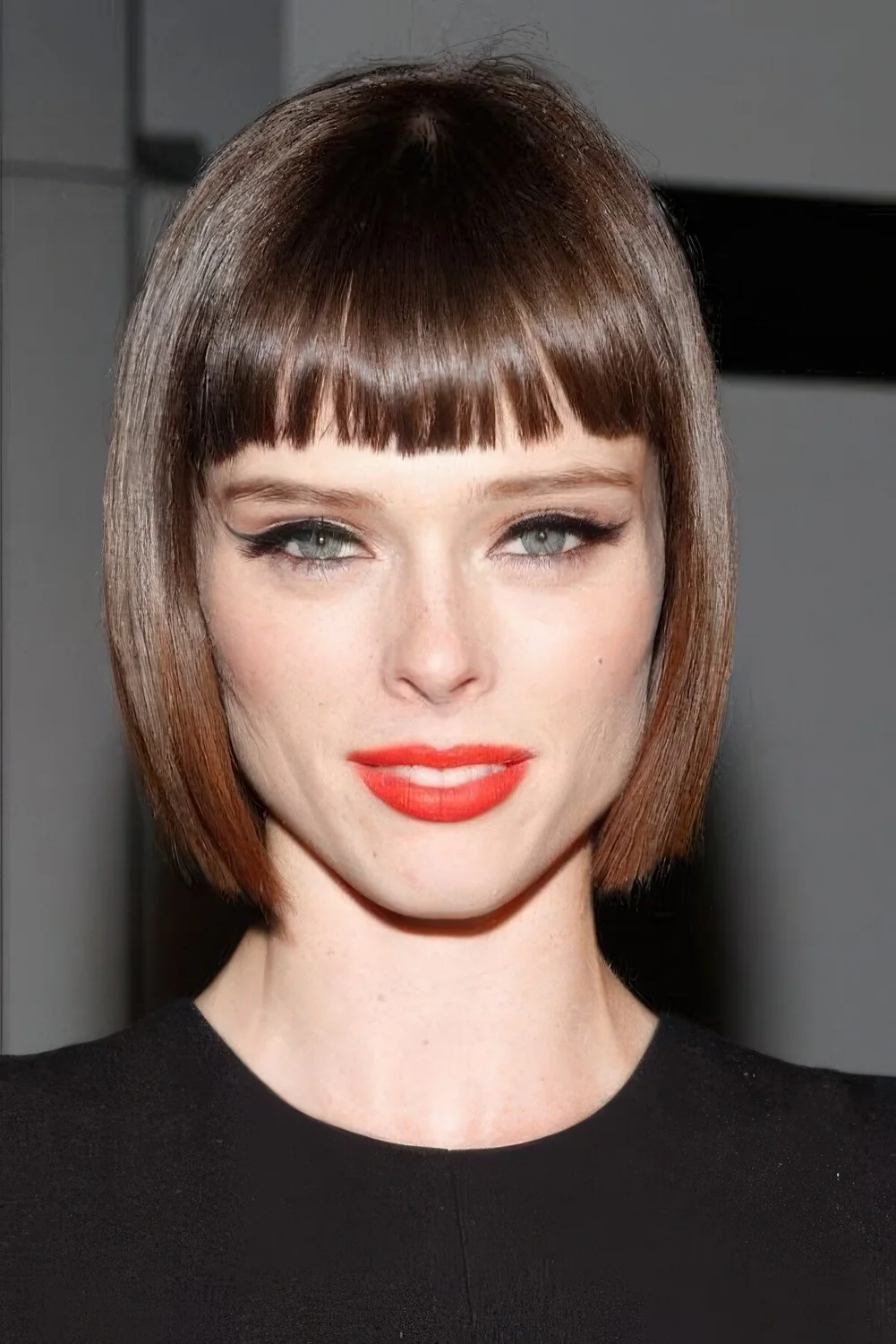 Angular brown liqud bob with a fringe.