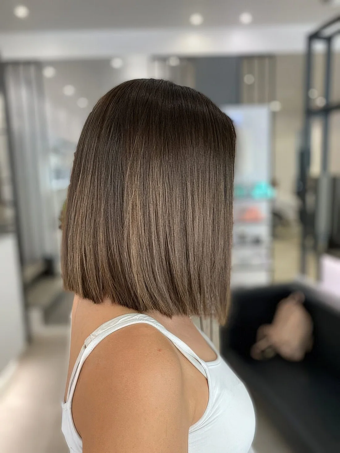 All natural brown long liquid bob with a bit of balayage.