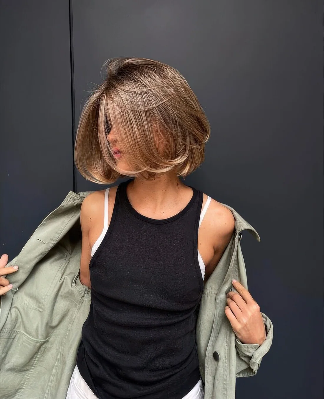 Photo showing bronde liquid bob, with the hairstyle clearly visible.