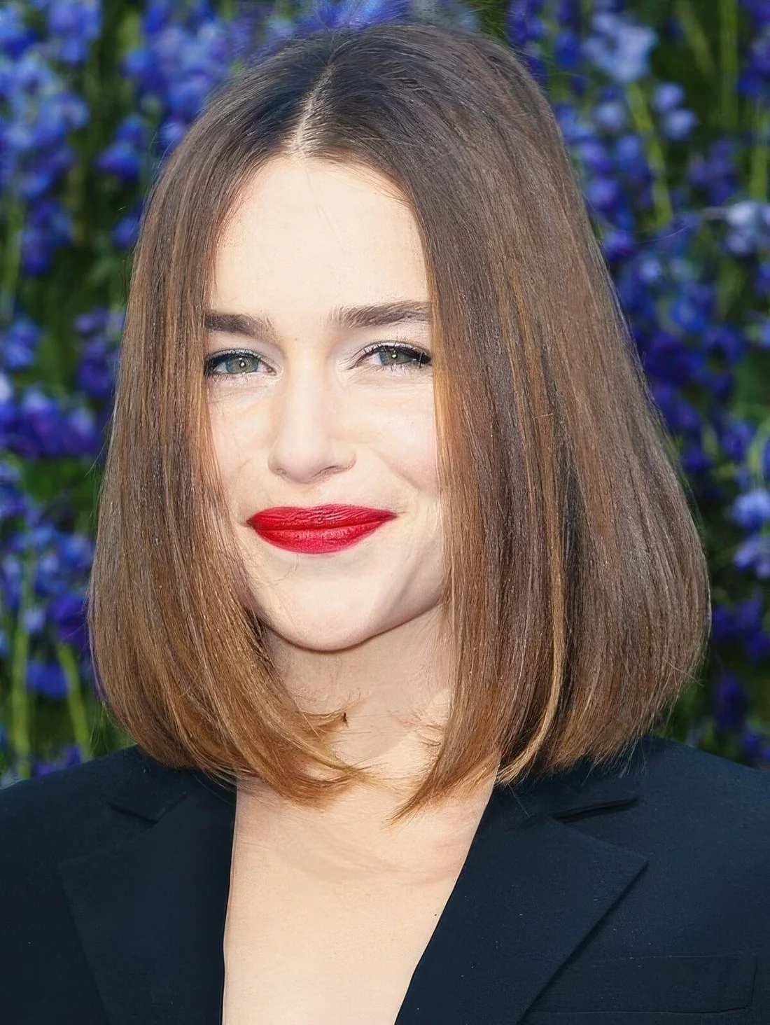Shiny sleek brown bob with a darker root.