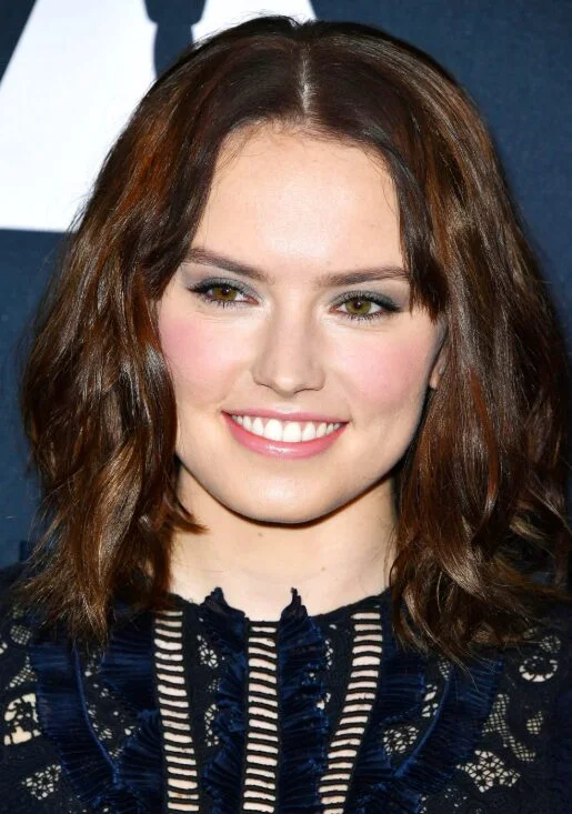 shoulder wavy chestnut lob shown as a lob haircuts for thin hair idea, featuring shoulder outline, shown in soft brunette wavy lob for fine hair