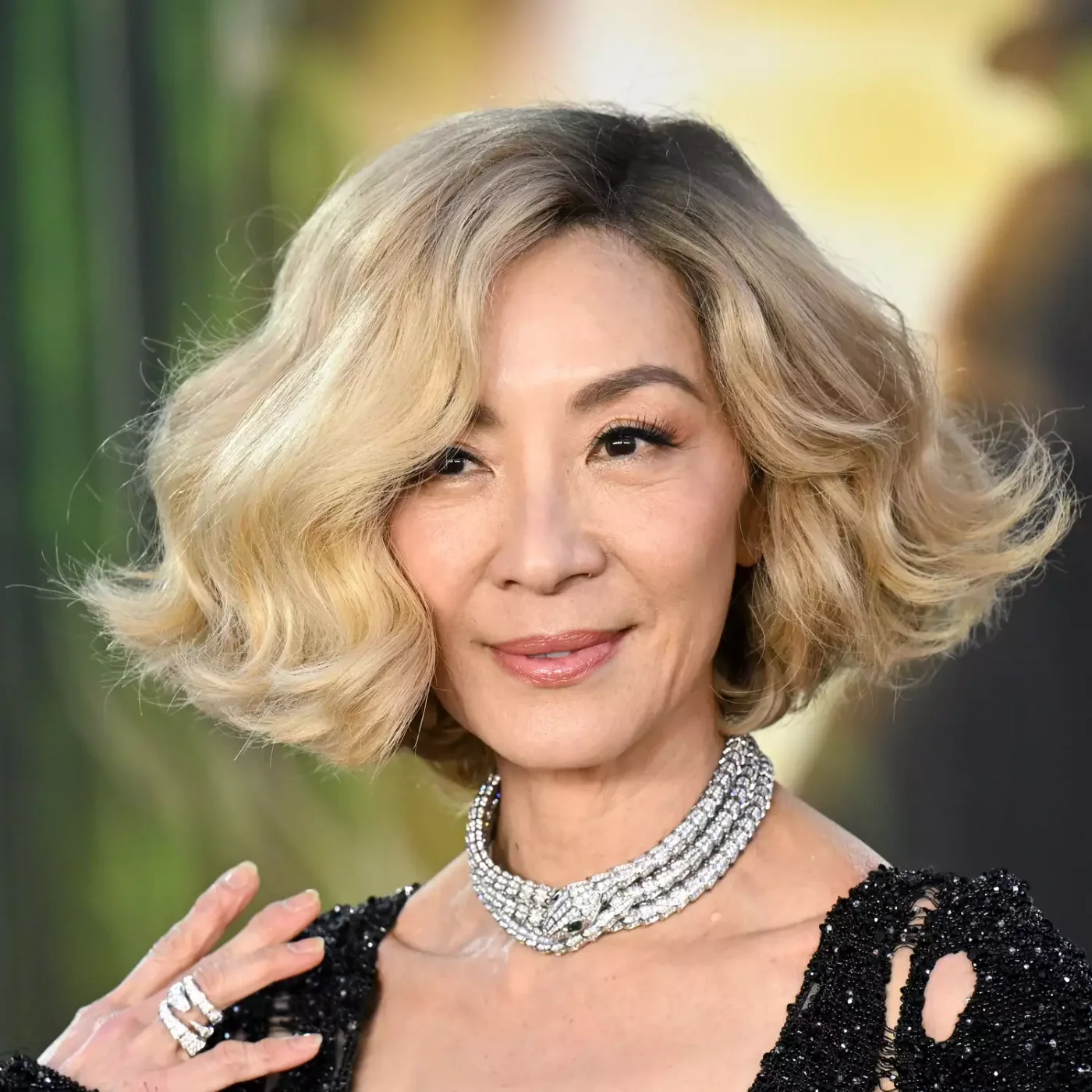 shoulder wavy chestnut lob shown as a lob haircuts for thin hair idea, featuring light layering, shown in soft blonde wave lob