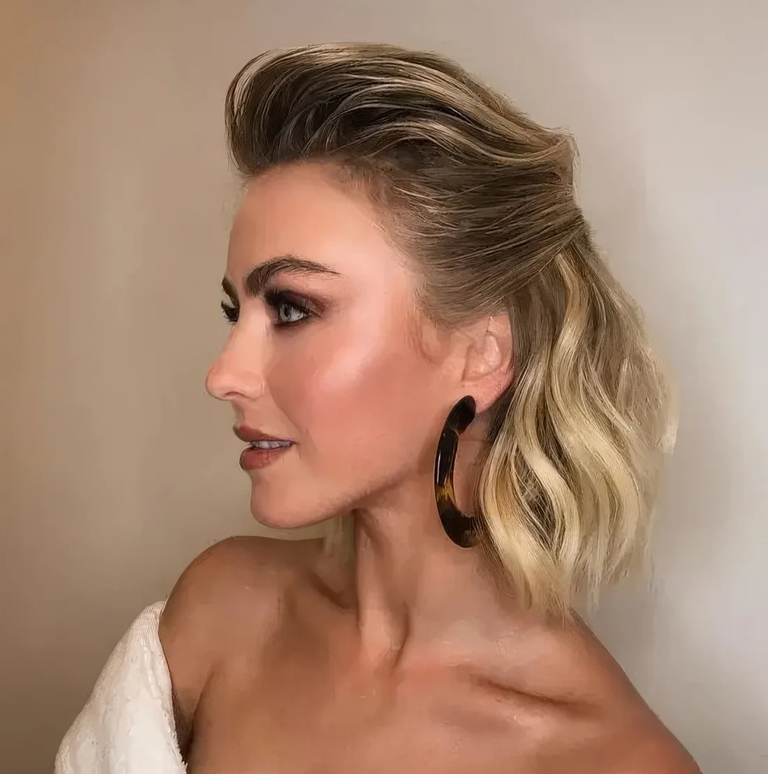 Classic half updo with a volume on top and waves down.