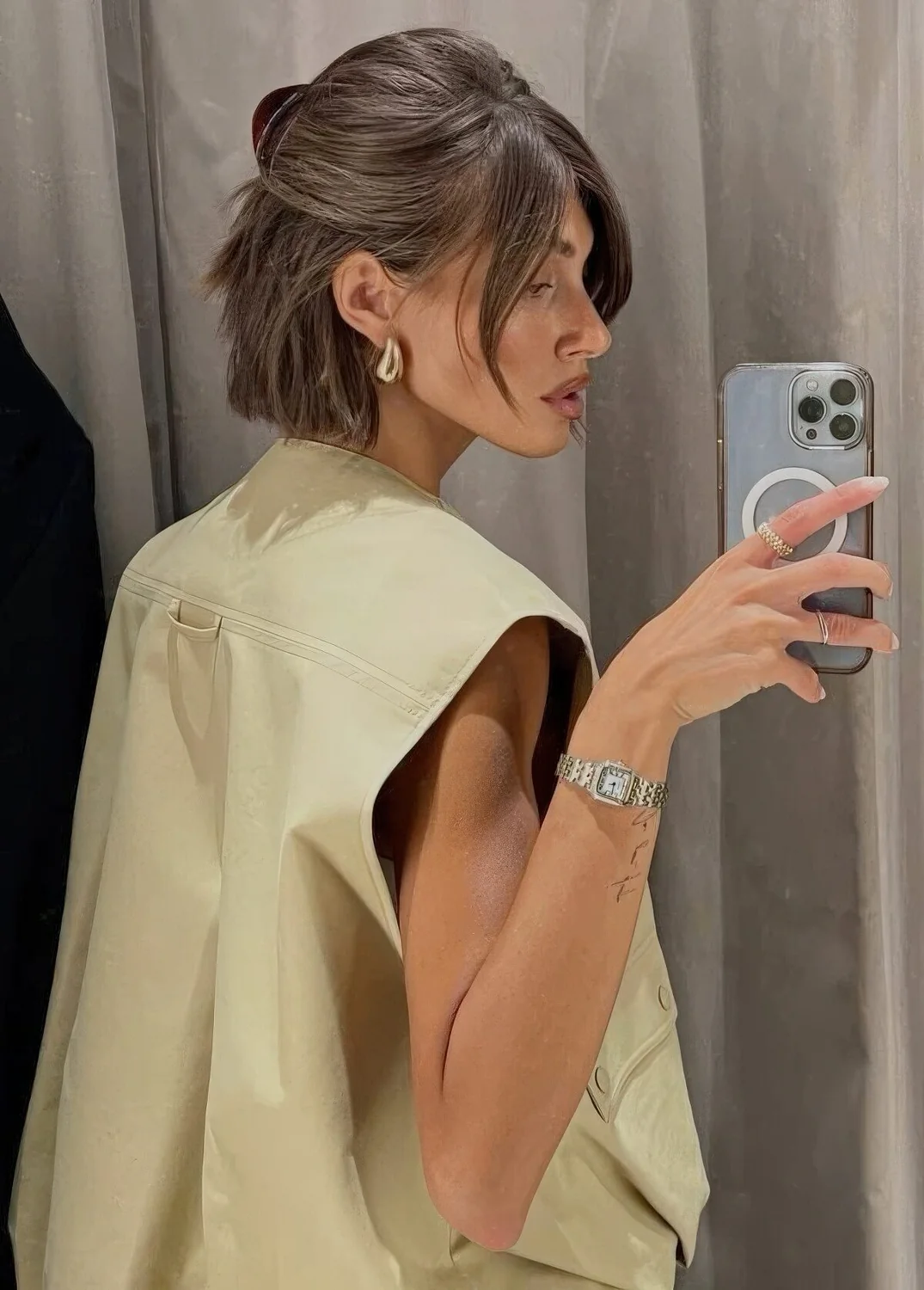 Half updo with a bump on top, bangs framing the face and a midi bun are great for long bobs.