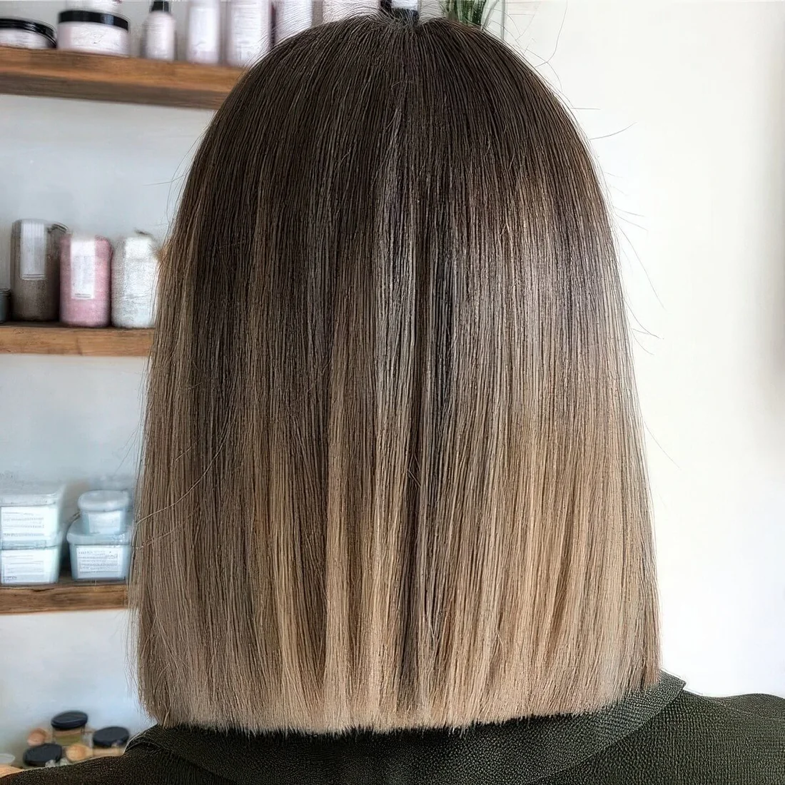 Blunt light brunette long bob with a blonde ombre touch.