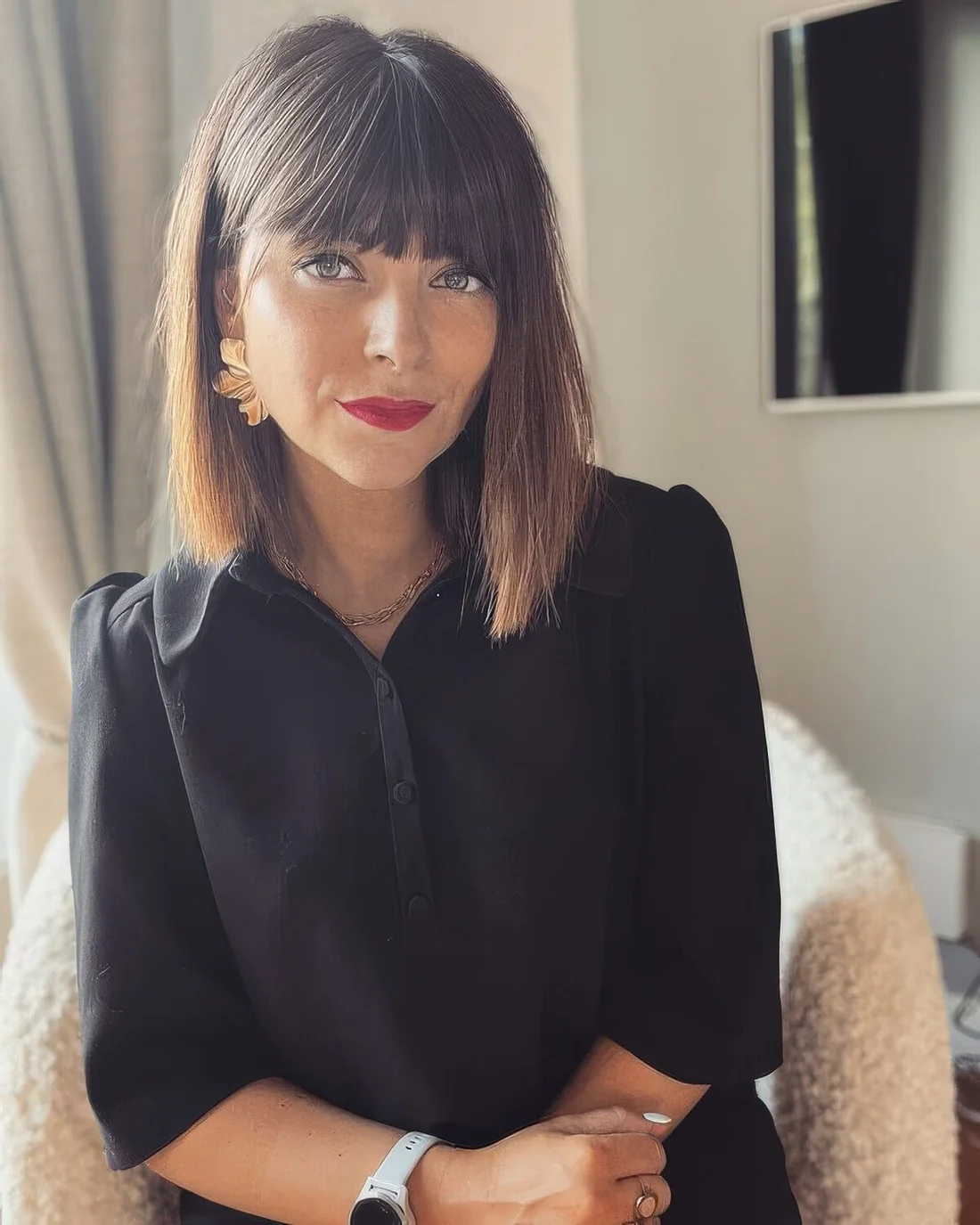 Dark brunette long bob with a caramel ombre touch and a classic fringe.