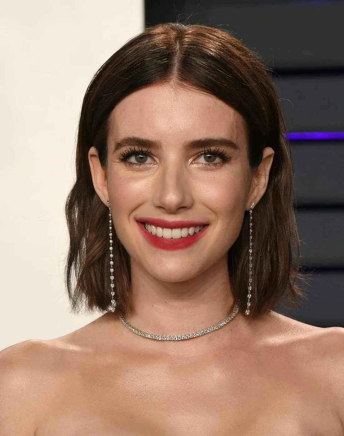 Dark brunette wavy long bob with muddle part.