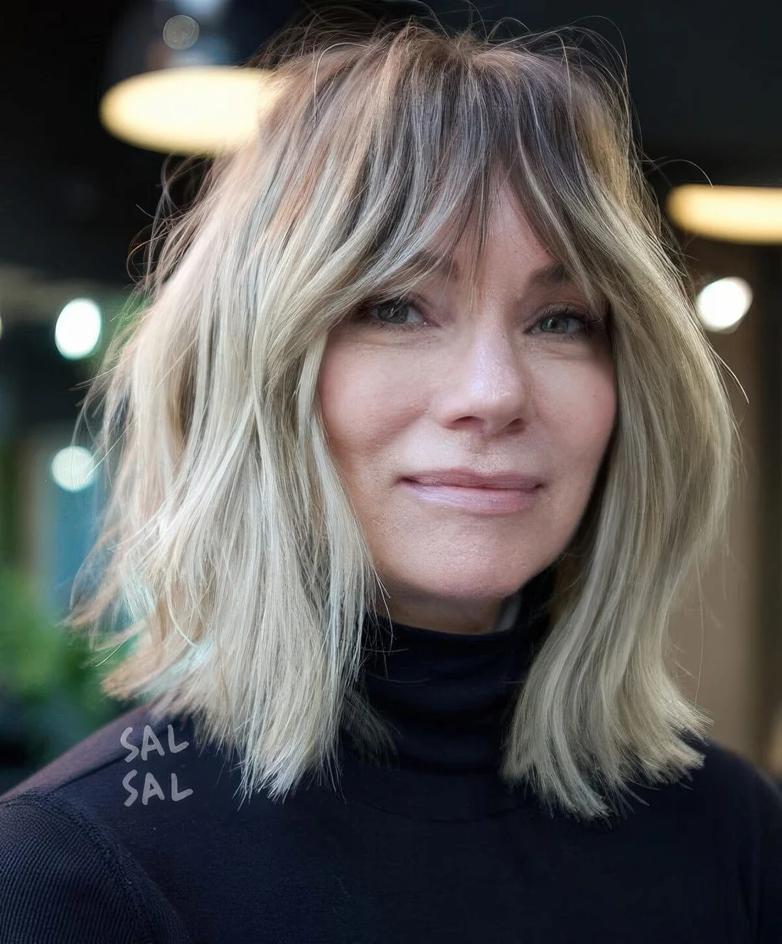 Photo showing blunt bob hairstyle, with the hairstyle clearly visible.