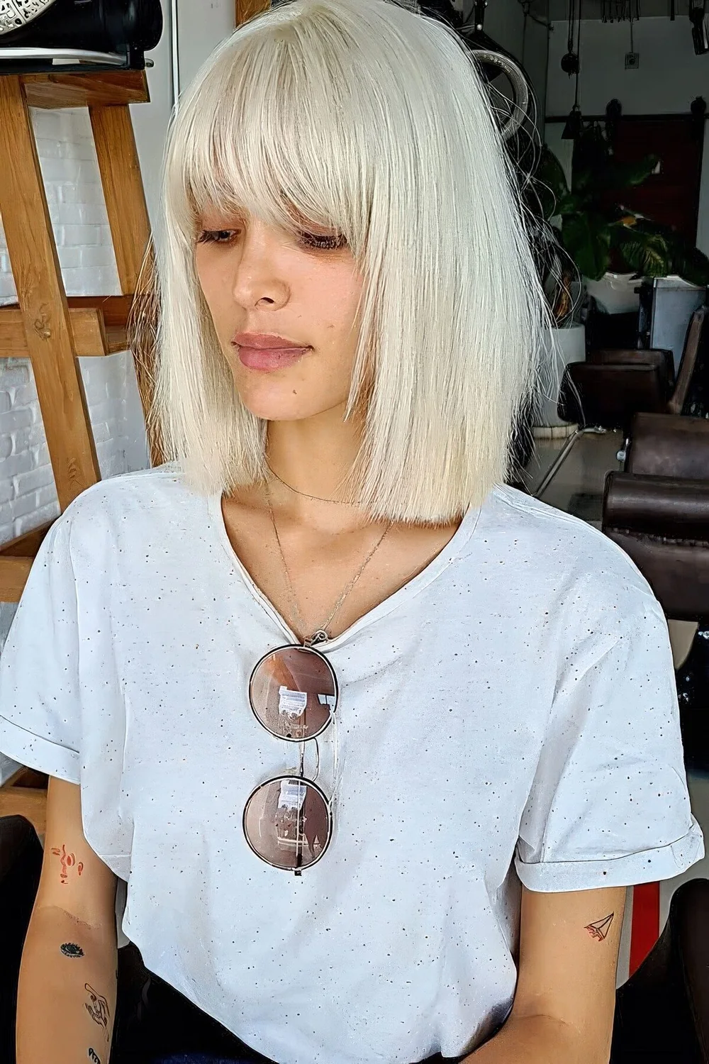 Photo showing bleach long bob, with the hairstyle clearly visible.