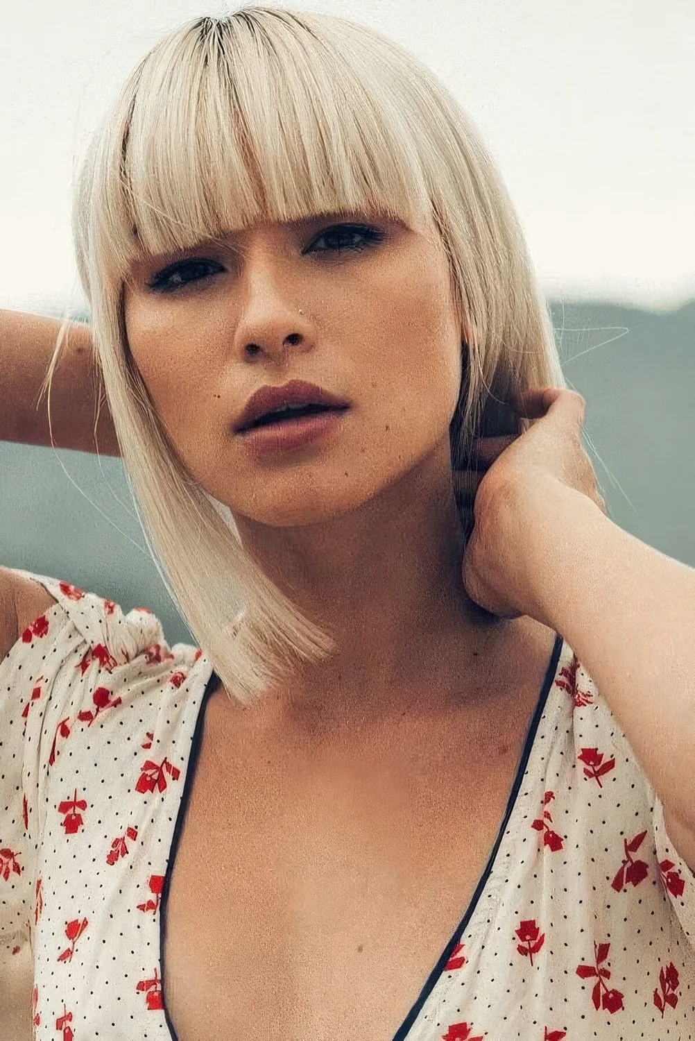 Photo showing blonde bob fringe, with the hairstyle clearly visible.