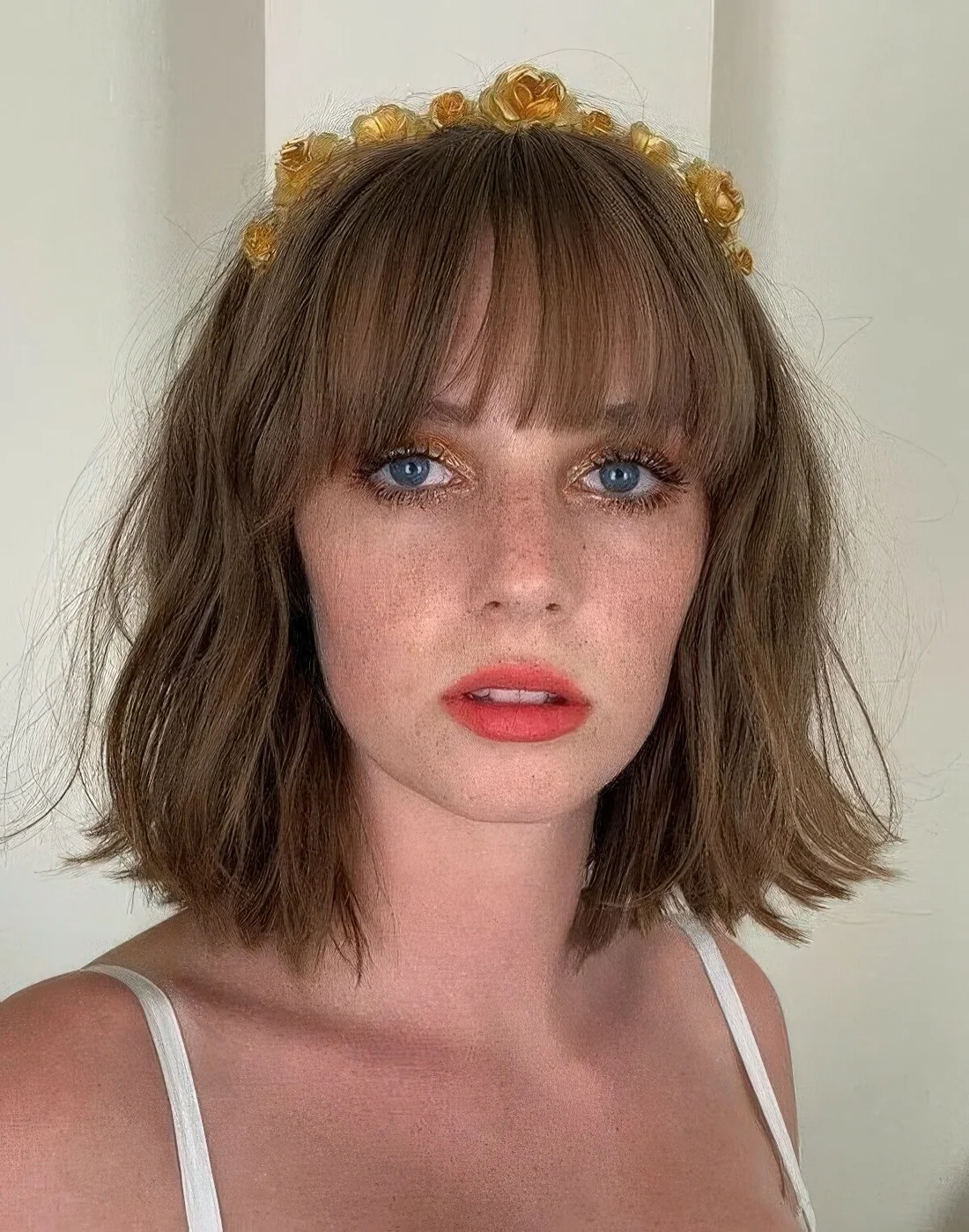 Photo showing bronde textural bob, with the hairstyle clearly visible.