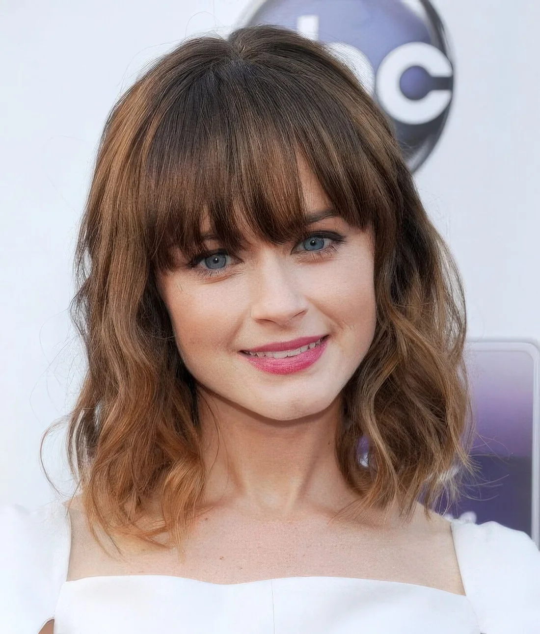 Photo showing brown bob caramel accent, with the hairstyle clearly visible.