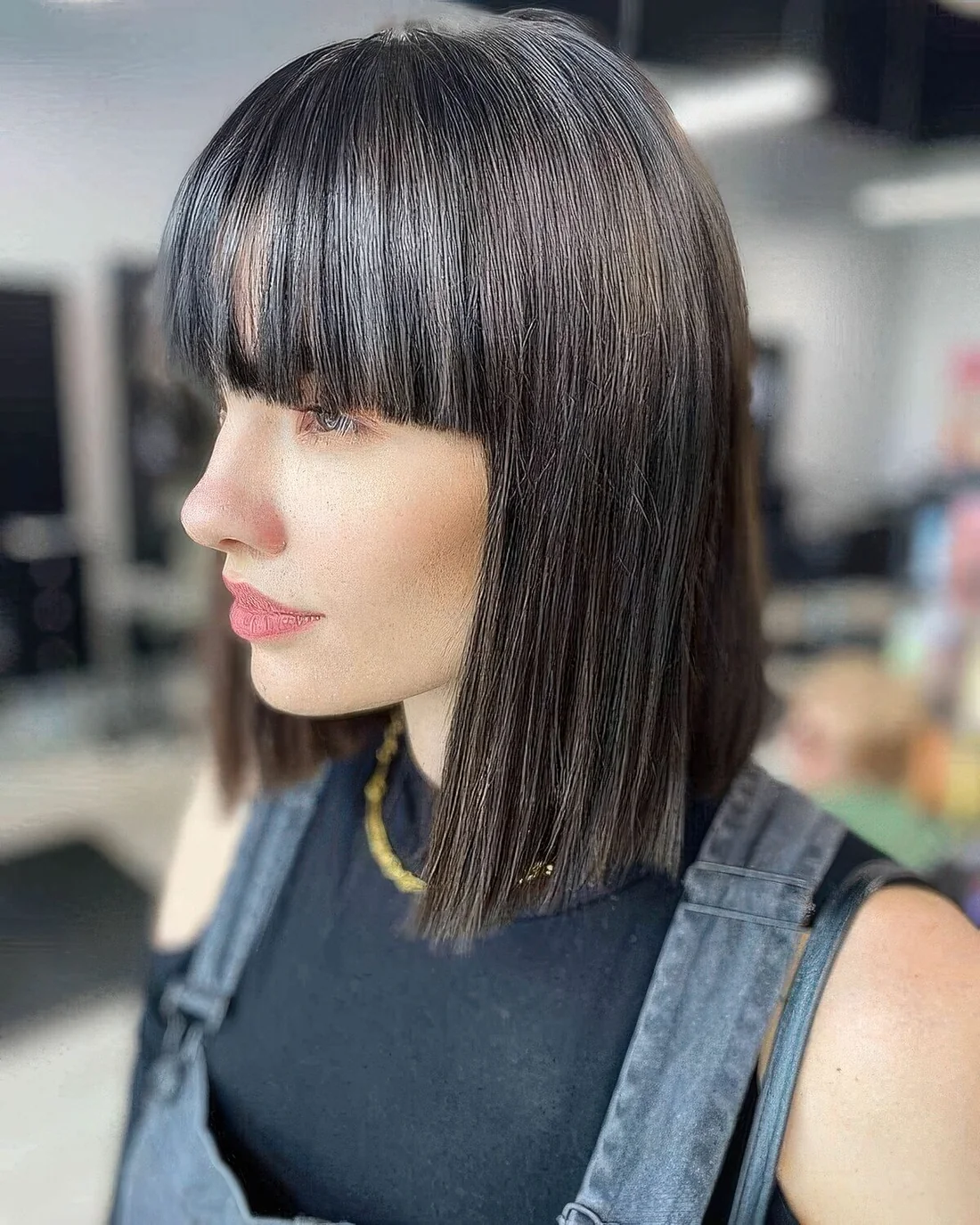 Photo showing cold brown bob, with the hairstyle clearly visible.