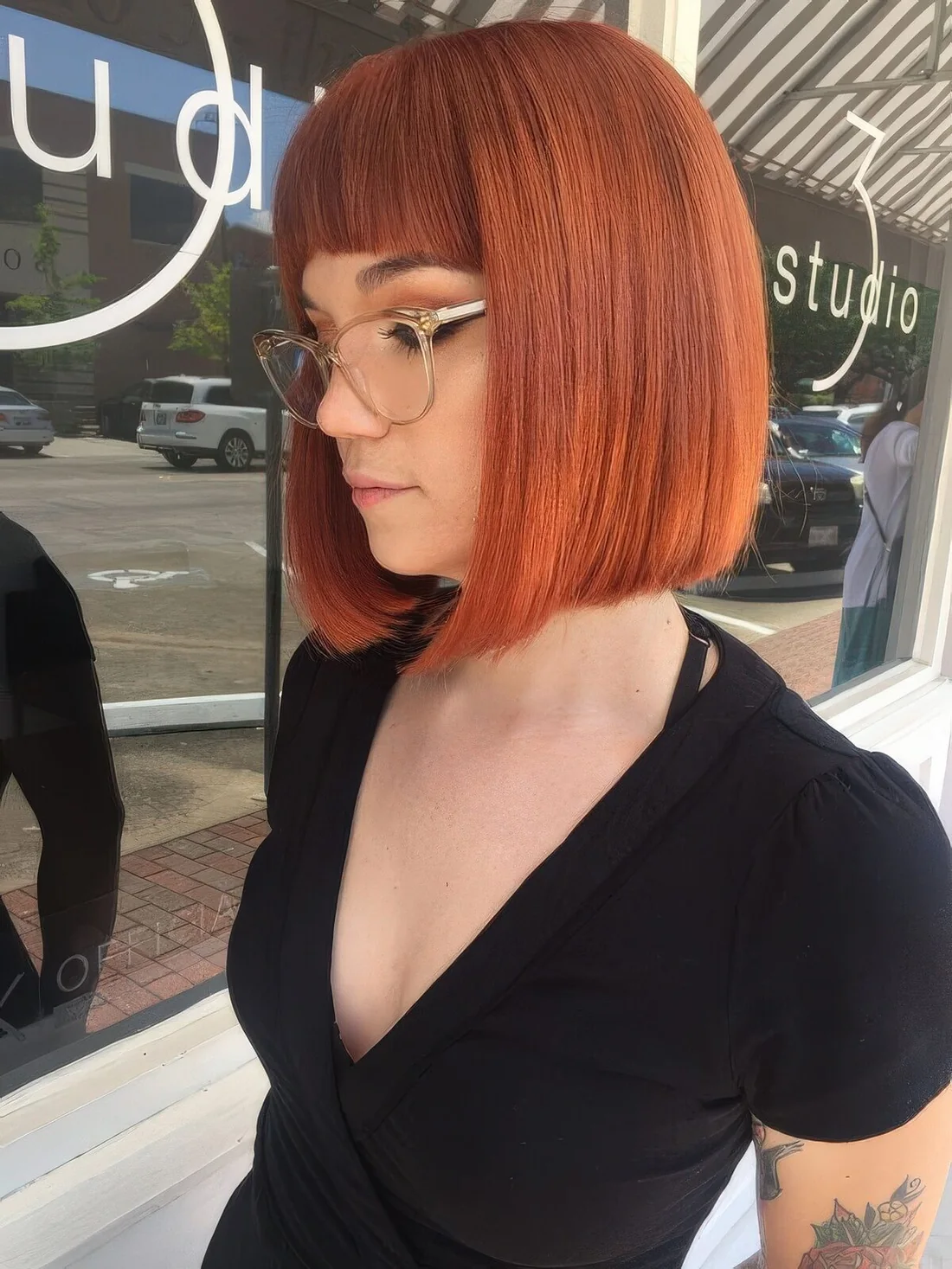 Photo showing ginger long bob, with the hairstyle clearly visible.