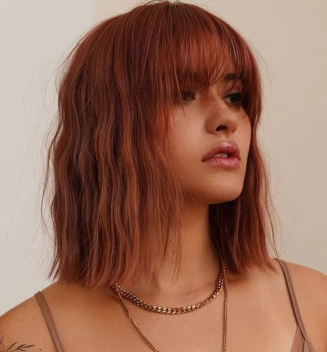 Photo showing red bob, with the hairstyle clearly visible.