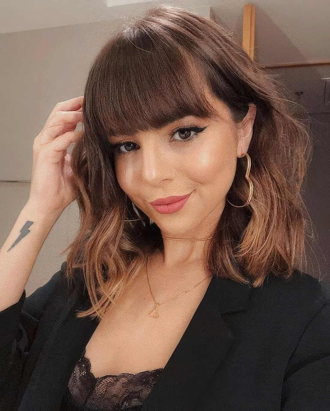 Photo showing textured long bob, with the hairstyle clearly visible.