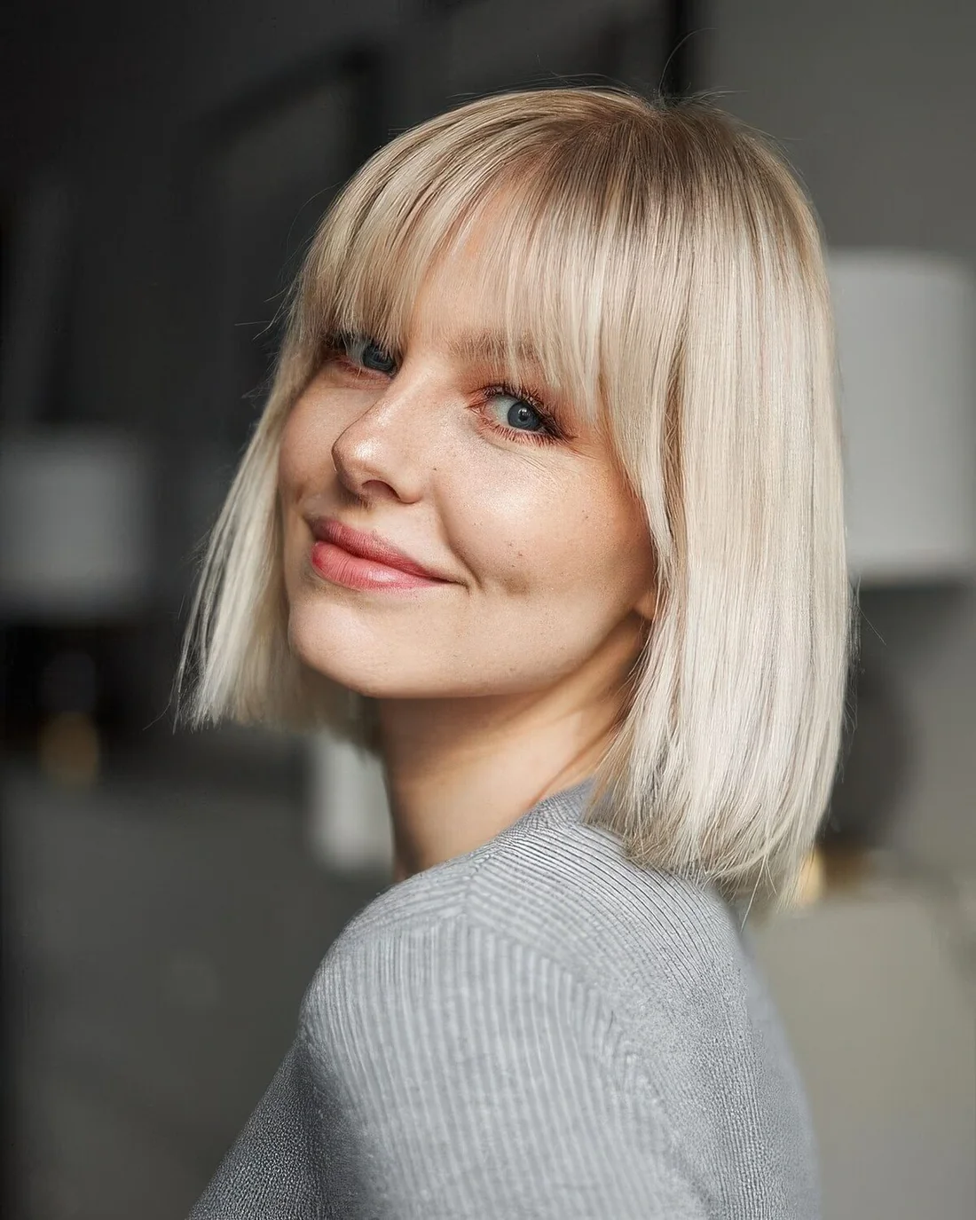 Photo showing icy blonde hairstyle, with the hairstyle clearly visible.