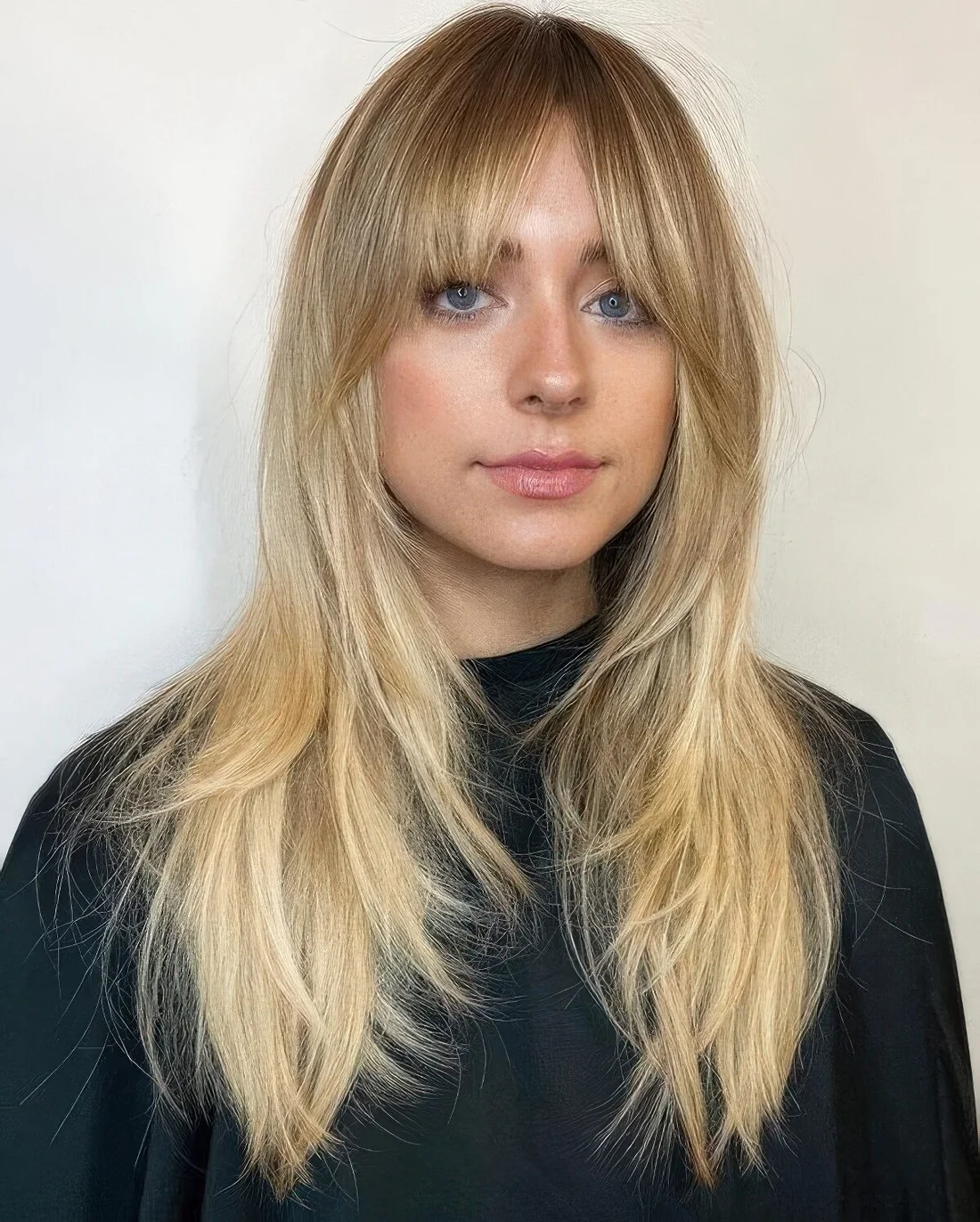 Photo showing long layered haircut, with the hairstyle clearly visible.