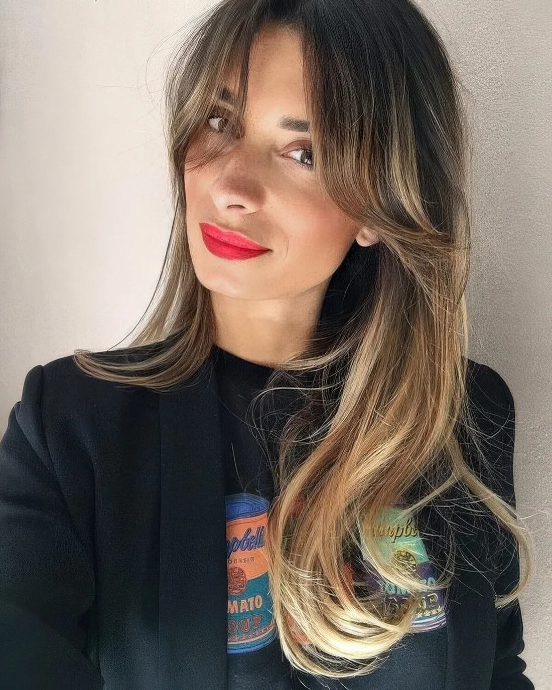 Photo showing long hair with balayage cut, with the hairstyle clearly visible.
