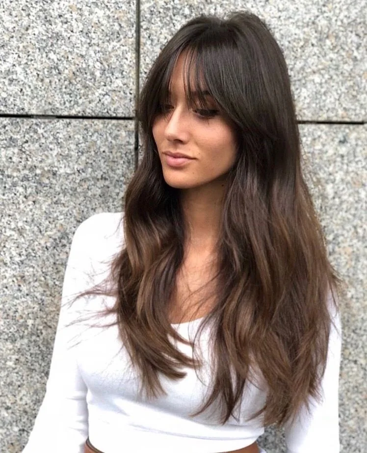 Photo showing shag with bangs, with the hairstyle clearly visible.