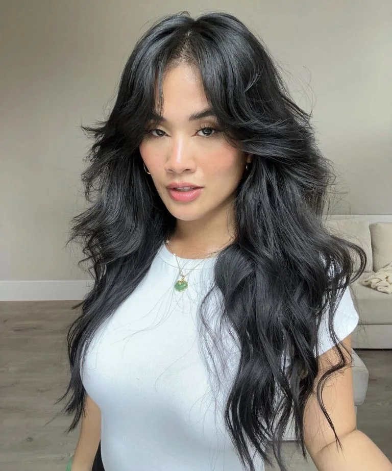 Photo showing long shaggy hair, with the hairstyle clearly visible.