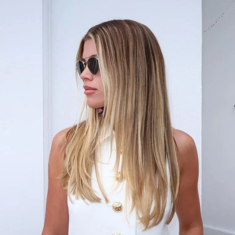 Photo showing long layered cut, with the hairstyle clearly visible.