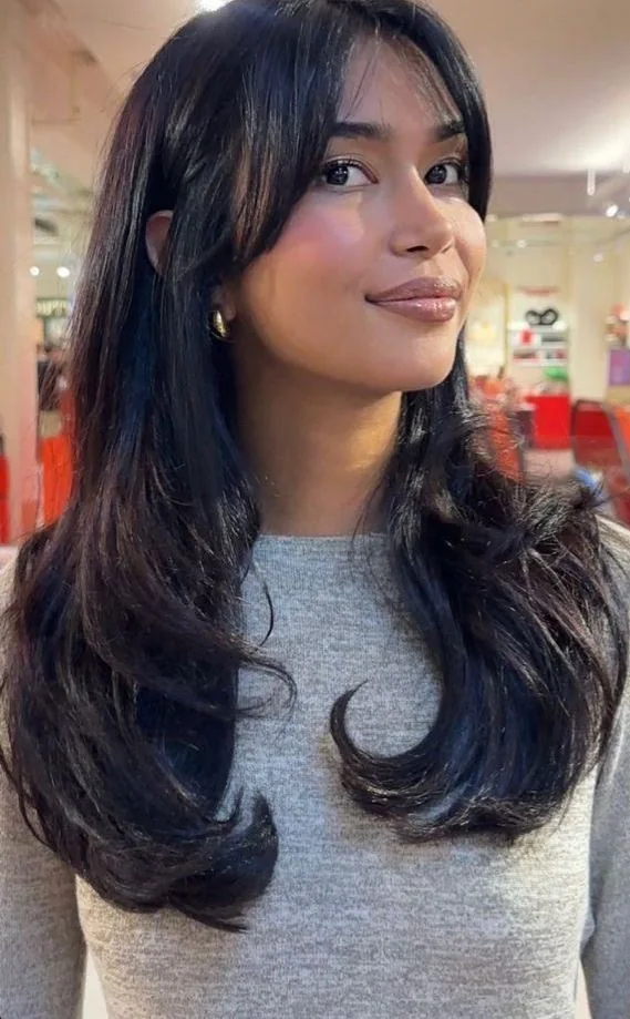 Photo showing butterfly haircut, with the hairstyle clearly visible.