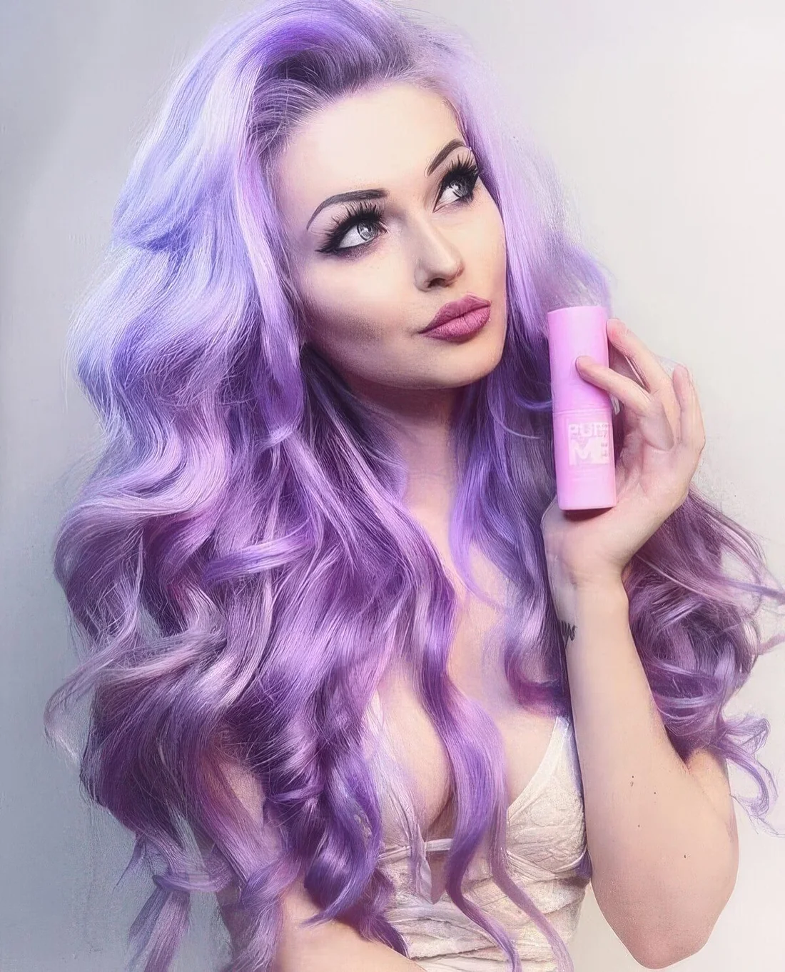 Jaw dropping lilac hair with a lot of volume and waves.