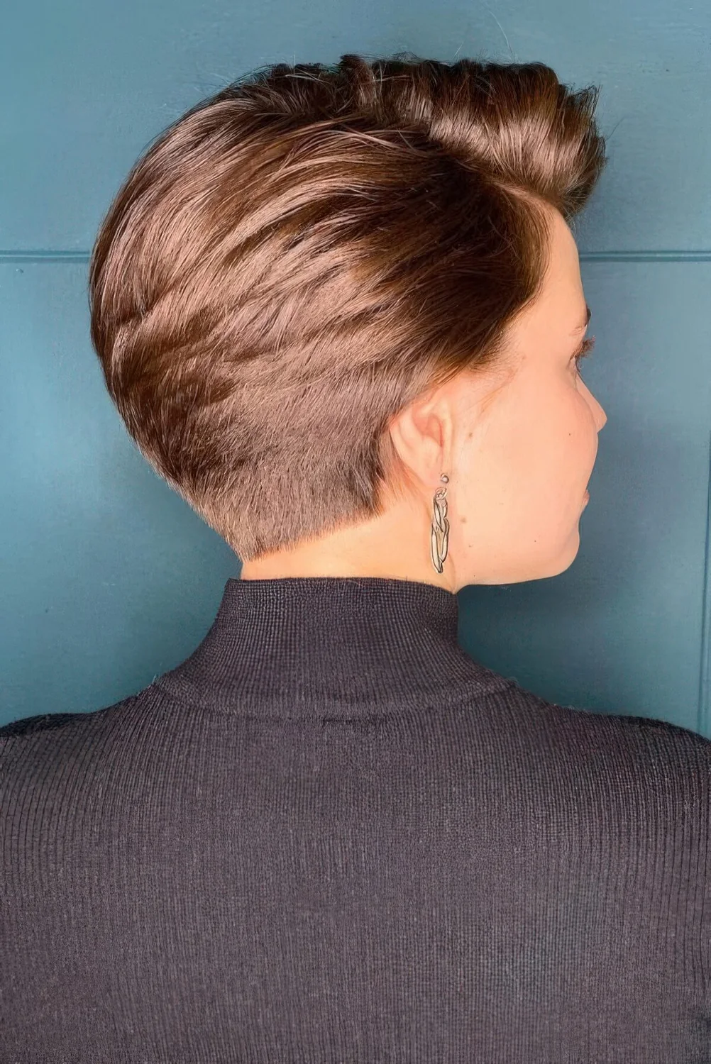 Brown long pixie on thick hair, the short length and stacked effect are a great combo for anyone with such hair.