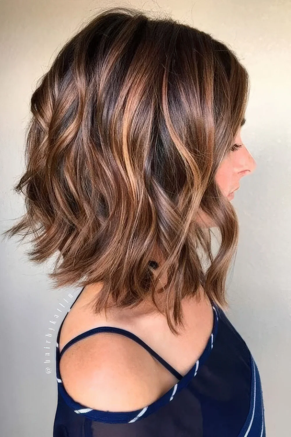 Photo showing long bob hairstyle, with the hairstyle clearly visible.