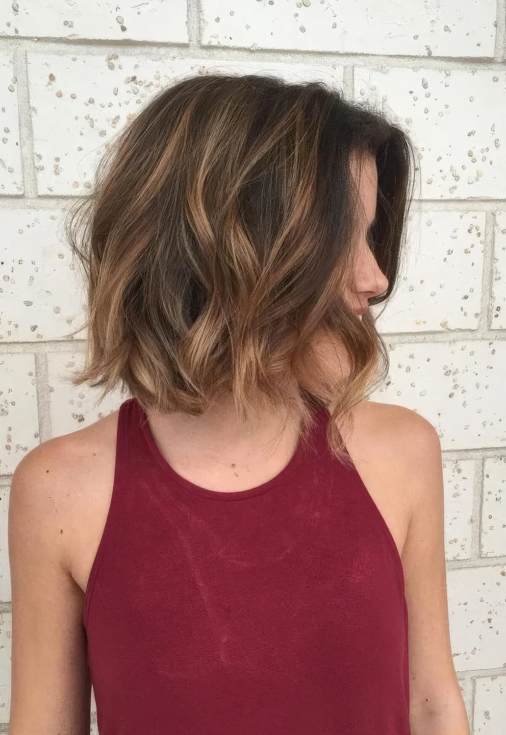 Photo showing caramel balayage idea, with the hairstyle clearly visible.