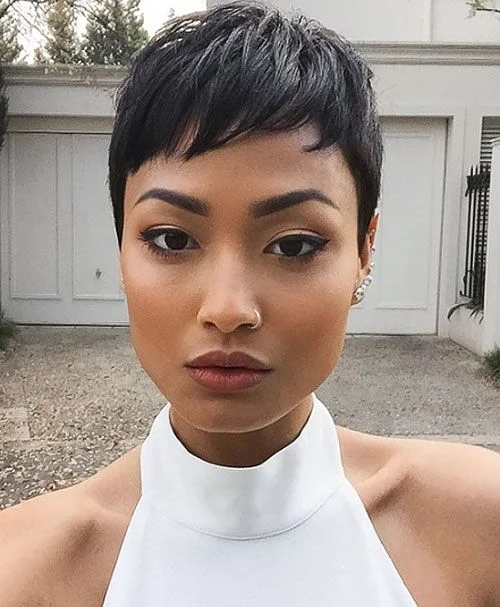 ear straight chestnut pixie with side swept fringe shown as a low maintenance haircuts for fine hair idea, featuring side swept fringe