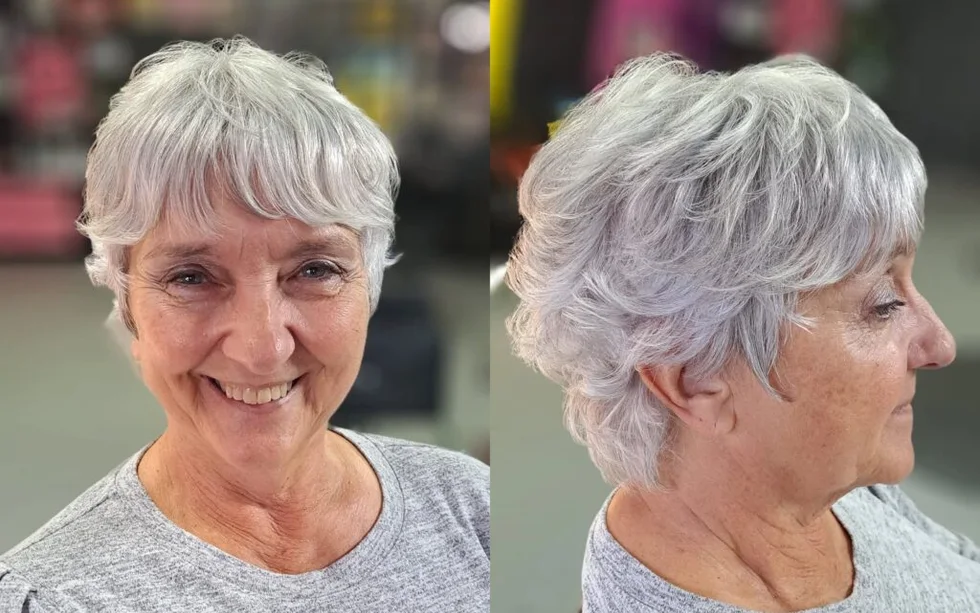 ear straight gray pixie with wispy fringe shown as a low maintenance hairstyles for 60 year old woman with fine hair idea, featuring light layering