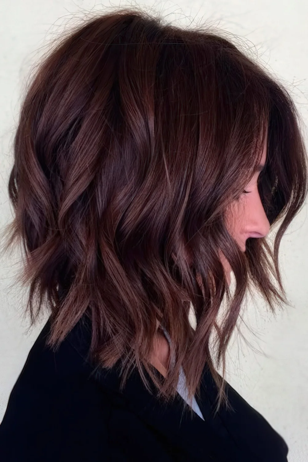 Go for layers on your medium-length hair to avoid a too flat look.