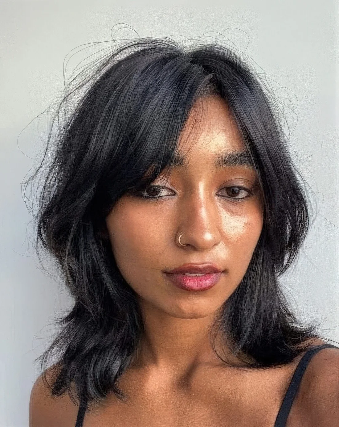 Photo showing simple outgrown bob, with the hairstyle clearly visible.