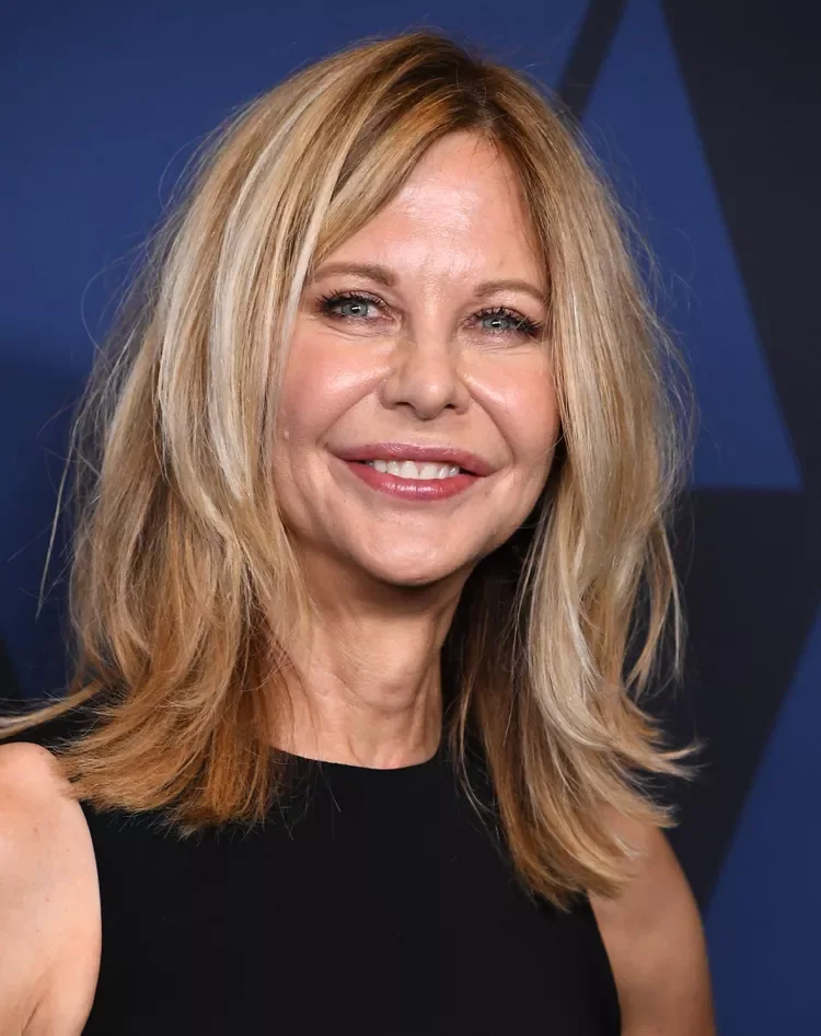 shoulder wavy blonde layers shown as a medium length haircut ideas for thin fine hair idea