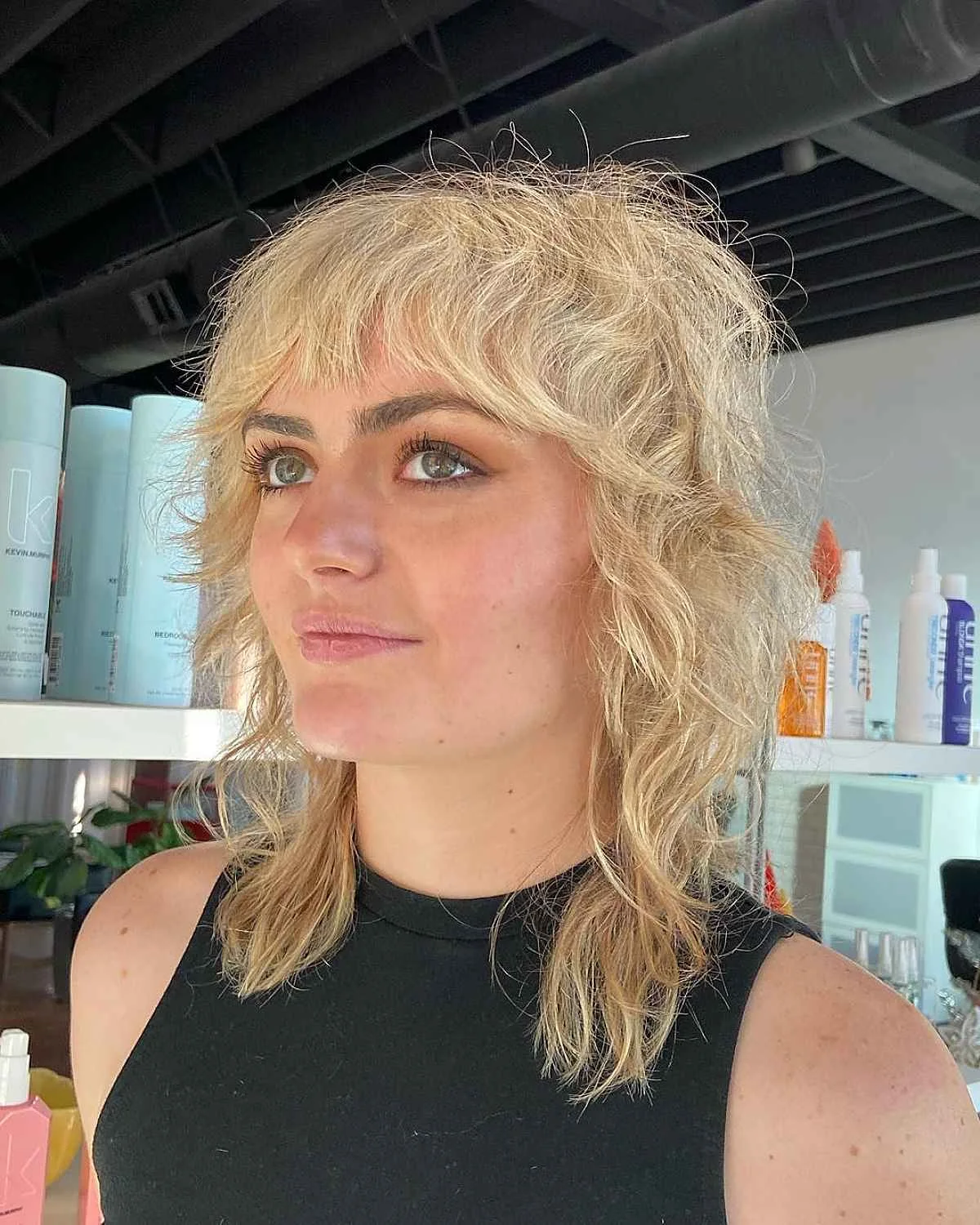 shoulder wavy chestnut shag with curtain fringe shown as a medium length haircut ideas for thin fine hair idea, featuring curtain fringe