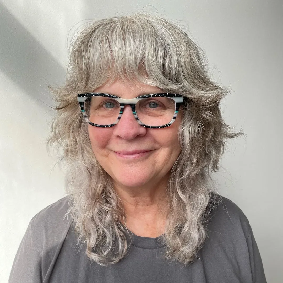 shoulder wavy silver shag with curtain fringe shown as a medium length haircut ideas for thin fine hair idea