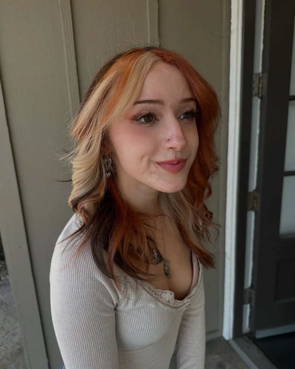 shoulder wavy copper shag with curtain fringe shown as a medium length haircuts for thick hair idea