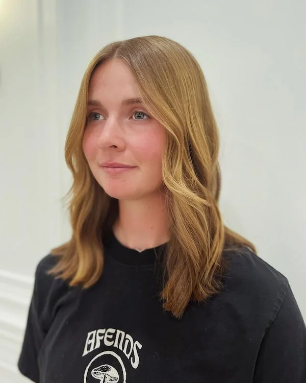 shoulder wavy honey lob shown as a medium length haircuts for thick hair idea