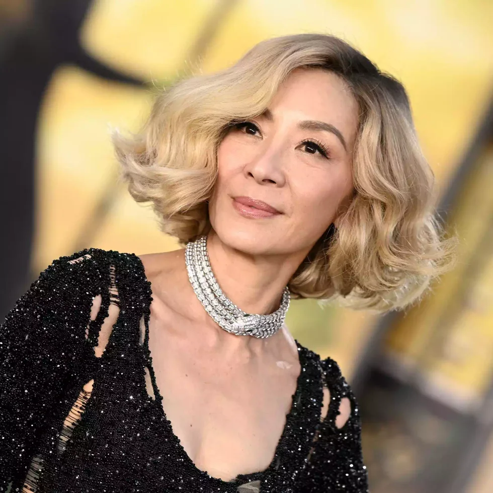 chin wavy blonde bob shown as a medium length haircuts for thick hair idea