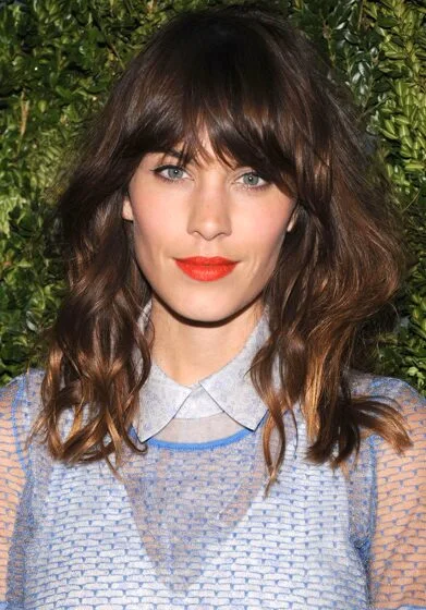 shoulder wavy chestnut shag with curtain fringe shown as a medium length haircuts for thick hair idea
