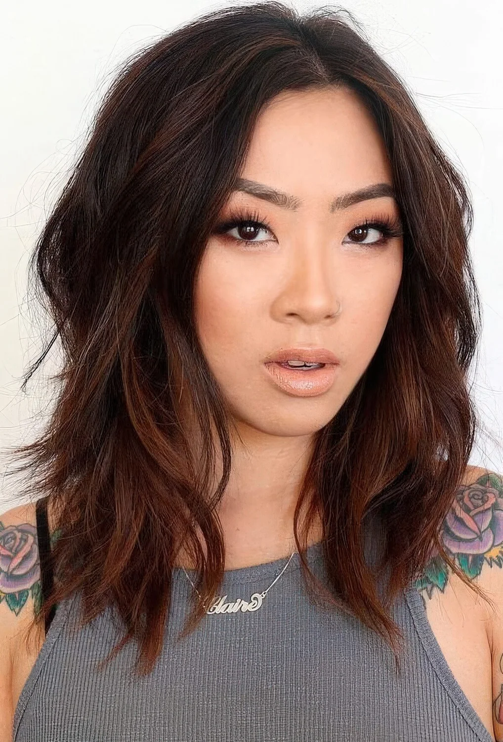 Haircut with layers and some balayage highlights to give it dimension.