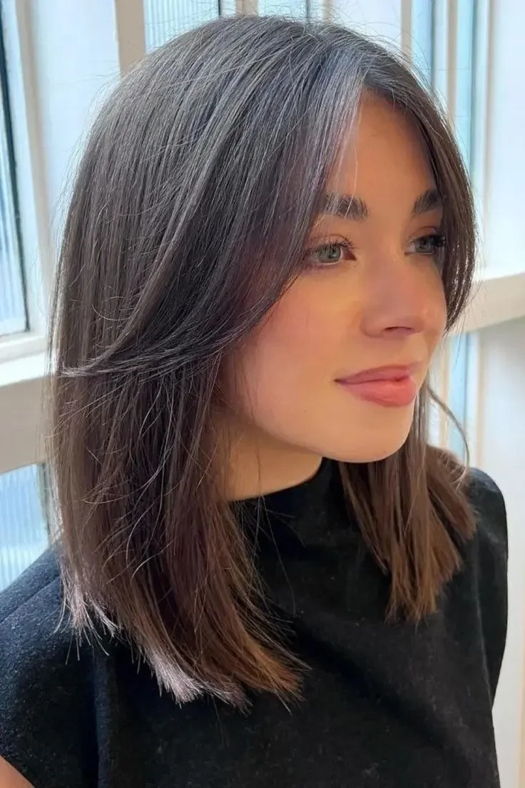Photo showing long bob curtain, with the hairstyle clearly visible.