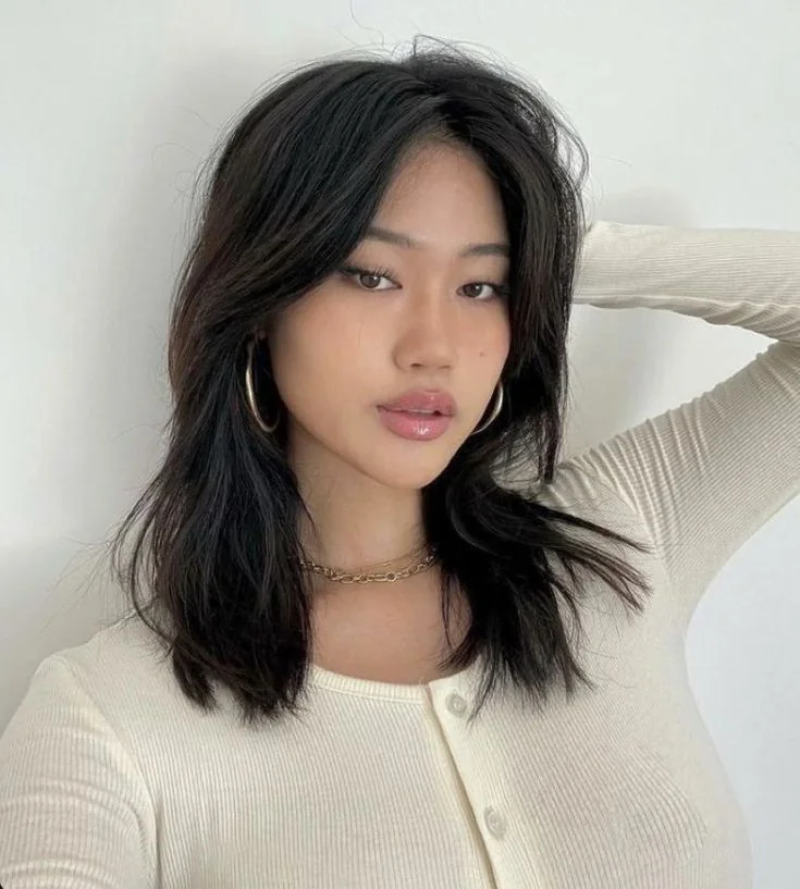 Photo showing s shaggy cut, with the hairstyle clearly visible.