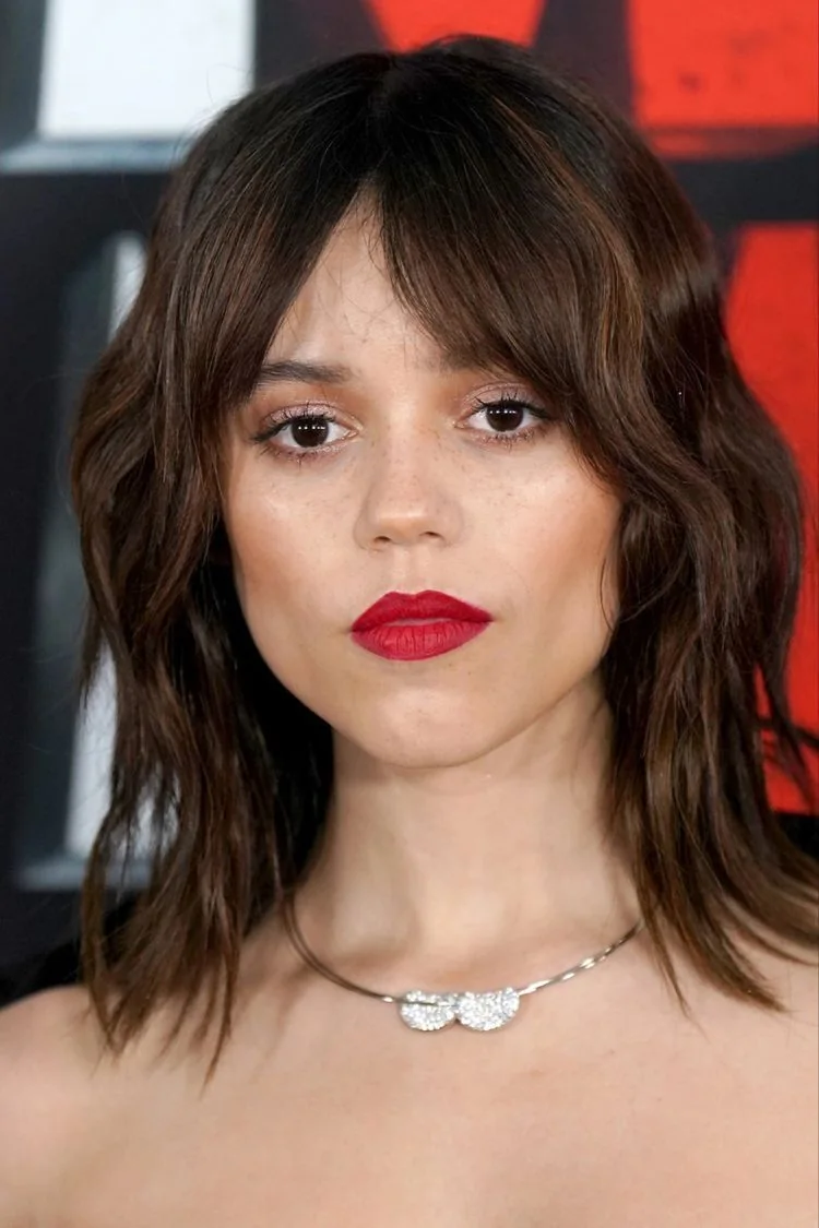 Photo showing messy shaggy cut, with the hairstyle clearly visible.