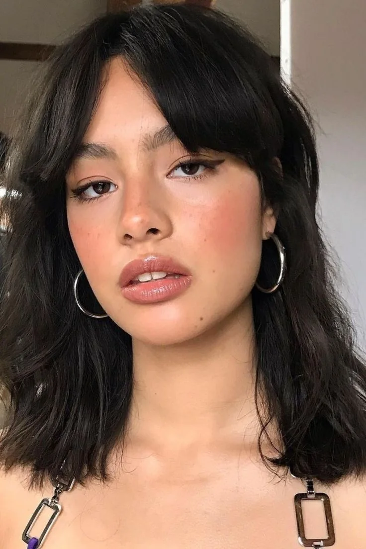 Photo showing shaggy cut bangs, with the hairstyle clearly visible.