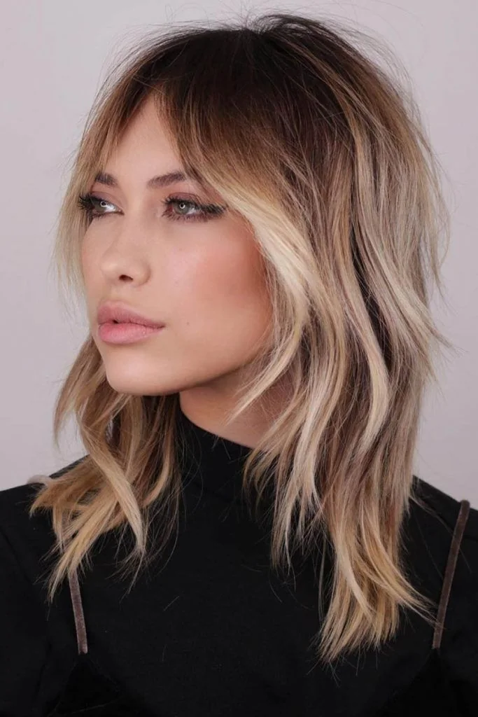 Photo showing shaggy layered cut, with the hairstyle clearly visible.